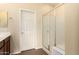 Bathroom featuring a glass enclosed shower and tiled floors at 10065 E Thatcher Ave, Mesa, AZ 85212