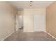 Bedroom featuring a ceiling fan, closet with sliding doors and a window at 10065 E Thatcher Ave, Mesa, AZ 85212