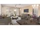 Staged living and dining area showcasing stylish furniture and décor at 10065 E Thatcher Ave, Mesa, AZ 85212