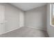 Bright and airy bedroom with neutral carpeting at 22531 E Orchard Ln, Queen Creek, AZ 85142