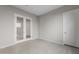 Spacious bedroom with mirrored closet doors and neutral walls at 22531 E Orchard Ln, Queen Creek, AZ 85142
