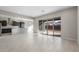 Open living space with kitchen views and sliding glass doors at 22531 E Orchard Ln, Queen Creek, AZ 85142