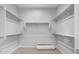 Spacious walk-in closet with ample shelving and hanging space at 22531 E Orchard Ln, Queen Creek, AZ 85142