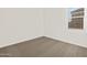 Bedroom featuring a window and carpeted floor at 24592 W Bowker St, Buckeye, AZ 85326