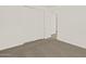 Neutral bedroom featuring carpet, white walls, and closet with sliding doors at 24592 W Bowker St, Buckeye, AZ 85326