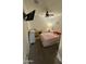 Well-lit bedroom featuring a ceiling fan and mounted TV at 5636 W Jackalope Ln, Laveen, AZ 85339