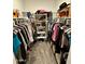 Walk-in closet with multiple levels of shelving and clothing racks at 5636 W Jackalope Ln, Laveen, AZ 85339
