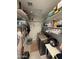 Organized laundry room with washer, dryer, and ample shelving at 5636 W Jackalope Ln, Laveen, AZ 85339