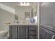 Well-lit bathroom featuring modern fixtures, a spacious vanity, and ample storage at 7750 E Broadway Rd # 723, Mesa, AZ 85208
