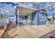 Charming single-story home with a covered carport and well-maintained front yard at 7750 E Broadway Rd # 723, Mesa, AZ 85208