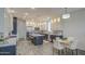 Open-concept kitchen with an island, stainless appliances, and adjoining dining area at 7750 E Broadway Rd # 723, Mesa, AZ 85208