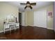 Bedroom with wood floors and a built-in vanity at 2541 E Carob Dr, Gilbert, AZ 85298