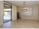 Bright dining area with sliding door leading to backyard at 2541 E Carob Dr, Gilbert, AZ 85298
