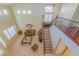 Open floor plan with high ceilings, staircase, and lots of natural light at 2541 E Carob Dr, Gilbert, AZ 85298
