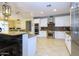 Modern kitchen with stainless steel appliances and granite countertops at 2541 E Carob Dr, Gilbert, AZ 85298