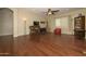 Relaxing living room featuring hardwood floors and a view to backyard at 2541 E Carob Dr, Gilbert, AZ 85298
