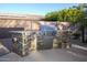 Built-in outdoor kitchen with stainless steel grill at 2541 E Carob Dr, Gilbert, AZ 85298