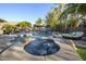 Relaxing pool and spa with waterfall feature at 2541 E Carob Dr, Gilbert, AZ 85298