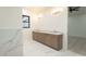 Bathroom featuring a vanity with double sinks and marble tile at 3888 E Weston Ln, San Tan Valley, AZ 85140