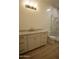 Well-lit bathroom boasting a marble countertop, modern finishes and a glass-enclosed shower at 3888 E Weston Ln, San Tan Valley, AZ 85140