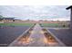 Newly landscaped front yard featuring decorative rocks, pavers, shrubs and in-ground lighting at 3888 E Weston Ln, San Tan Valley, AZ 85140
