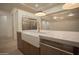 Chef's kitchen with a farmhouse sink, stainless appliances, and custom cabinets at 3888 E Weston Ln, San Tan Valley, AZ 85140