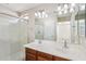 Double vanity bathroom with large shower at 1967 W Busoni Pl, Phoenix, AZ 85023