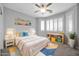 bedroom with light-colored bed and toy shelves at 28308 N 157Th Pl, Scottsdale, AZ 85262