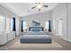 Main bedroom with blue platform bed and white dresser at 28308 N 157Th Pl, Scottsdale, AZ 85262
