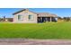 One-story house with a large green lawn and a covered patio at 28308 N 157Th Pl, Scottsdale, AZ 85262