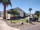 Charming single-Gathering home with well-maintained lawn, mature trees, and circular driveway at 18029 W San Miguel Ave, Litchfield Park, AZ 85340