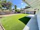 Backyard with new synthetic grass at 2213 E Janice Way, Phoenix, AZ 85022