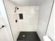 Stylish bathroom featuring a tiled walk-in shower with black accents at 2213 E Janice Way, Phoenix, AZ 85022