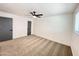 Bright bedroom features plush carpet and fresh paint at 2213 E Janice Way, Phoenix, AZ 85022