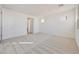 Bedroom with neutral carpet, white walls, and natural light from windows at 28958 N 174Th Ln, Surprise, AZ 85387