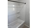 Bathroom with a shower/tub combo and white fixtures at 2593 E Bluff Spring Ave, Apache Junction, AZ 85119