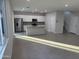 Open living area with tile floors and lots of natural light at 2593 E Bluff Spring Ave, Apache Junction, AZ 85119