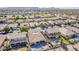 Stunning aerial view of a neighborhood showcasing beautiful houses with private pools and well-maintained landscaping at 3414 E Virgil Dr, Gilbert, AZ 85298