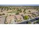 A beautiful community surrounds a home located on a golf course with mature landscaping at 3414 E Virgil Dr, Gilbert, AZ 85298