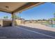 Covered back patio with brick pavers and an outdoor kitchen at 3414 E Virgil Dr, Gilbert, AZ 85298