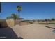 Expansive backyard patio, outdoor grill, and view fencing, offering privacy and relaxation at 3414 E Virgil Dr, Gilbert, AZ 85298