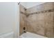 Close-up of a tiled shower with a built-in soap shelf at 3414 E Virgil Dr, Gilbert, AZ 85298