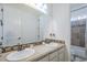 Bathroom with double sinks, granite counters, and a tiled backsplash and shower at 3414 E Virgil Dr, Gilbert, AZ 85298