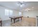 Spacious game room featuring a pool table and plenty of space for entertaining at 3414 E Virgil Dr, Gilbert, AZ 85298