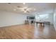 This game room has wood floors, a bar area with barstool seating and a staircase nearby at 3414 E Virgil Dr, Gilbert, AZ 85298