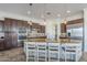 Gourmet kitchen with a large island and seating for four at 3414 E Virgil Dr, Gilbert, AZ 85298
