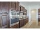 Well-equipped kitchen with built-in appliances and tile backsplash at 3414 E Virgil Dr, Gilbert, AZ 85298