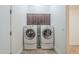 Laundry room with cabinetry for storage and tile flooring at 3414 E Virgil Dr, Gilbert, AZ 85298