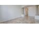 Spacious living room featuring tile flooring, decorative trim, and recessed lighting at 3414 E Virgil Dr, Gilbert, AZ 85298
