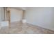 Spacious living room featuring tile flooring, decorative trim, and recessed lighting at 3414 E Virgil Dr, Gilbert, AZ 85298